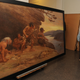 A Charles Knight mural from 1920 depicting a Neanderthal family in southern France.